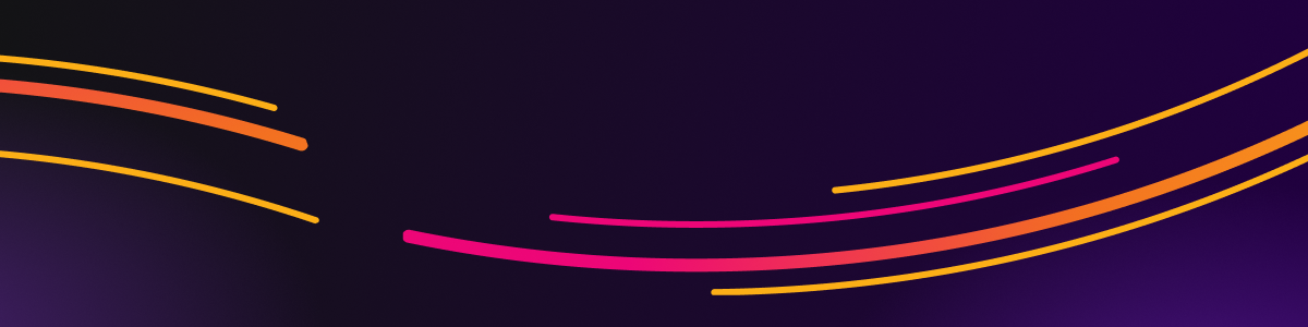 Pink and orange light trails in a wave pattern.