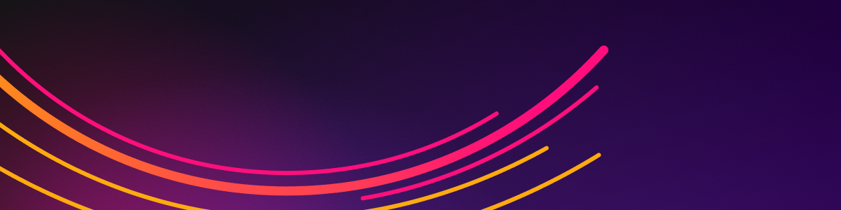 Pink and orange light trails in a semicircular pattern.